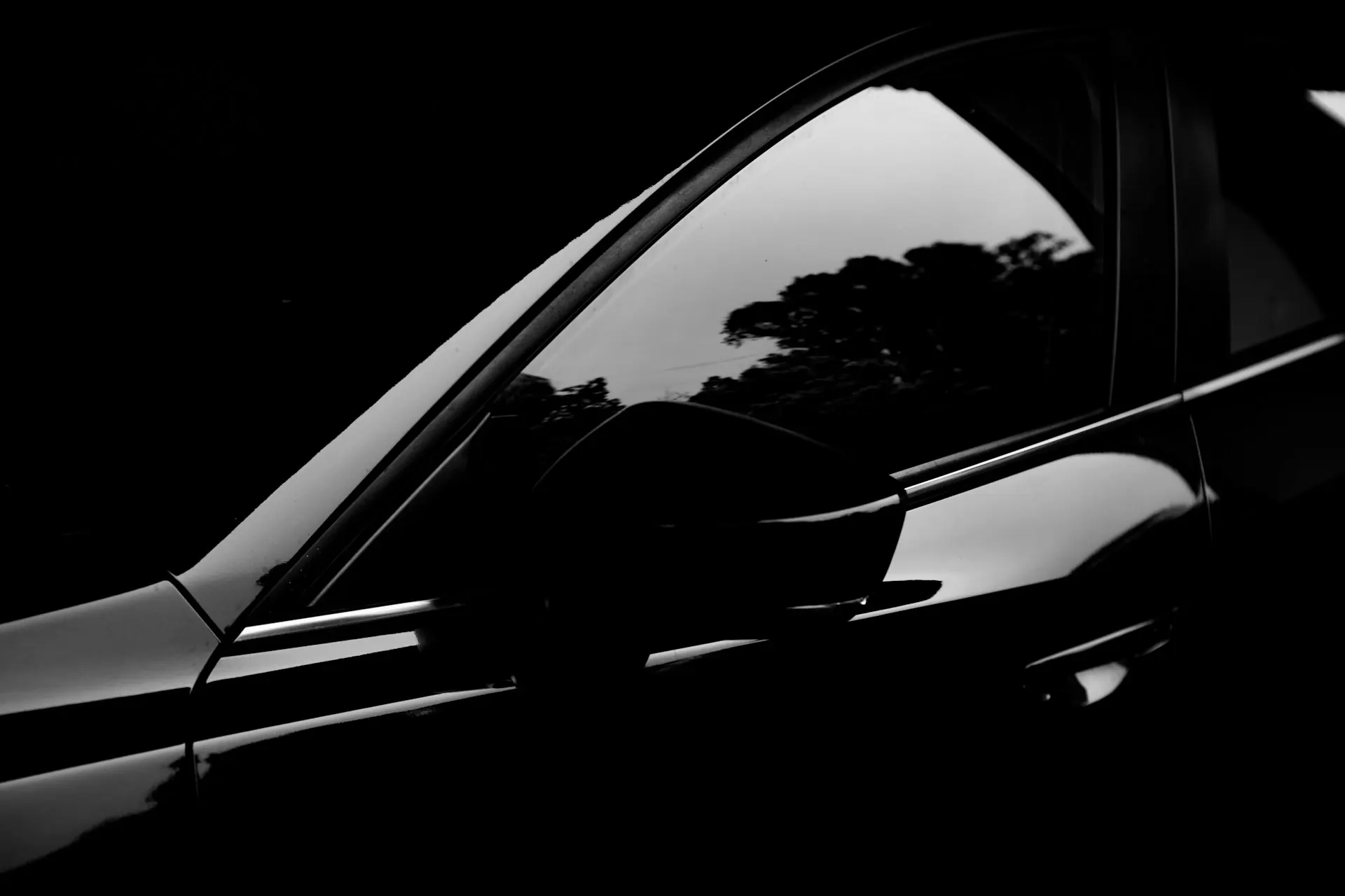 Light running along the window line of a black car